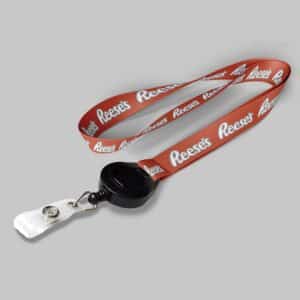 3/4" Texas Orange custom lanyard printed with company logo with Black Badge Reel attachment 0.75"