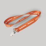 1" Orange custom lanyard printed with company logo with Bulldog Clip attachment 1"